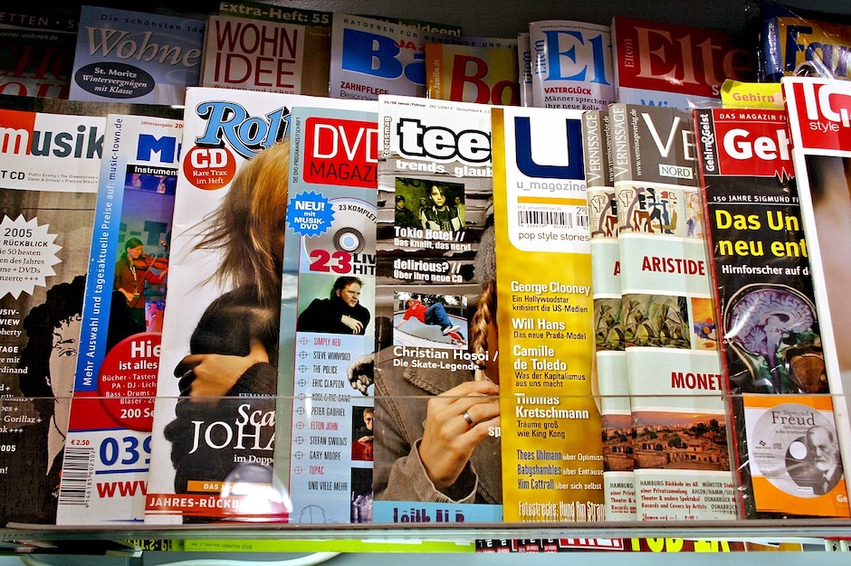 This image is a photograph of magazines at a news stand. Such magazines are examples of popular sources and are thus not suitable as sources for a technical paper. Examples of such magazines shown include Time, Newsweek, People, Popular Mechanics, Car and Driver and Cosmopolitan.