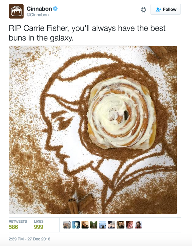 Cinnabon ad on Twitter. Text reads: RIP Carrie Fisher. You'll always have the best buns in the galaxy. Image is a sketch of Princess Leia with a cinnamon roll for one of her buns.